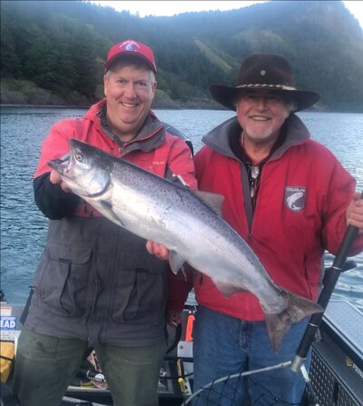 Bob Rees and Buzz Ramsey with a fresh catch on Drano Lake May 2024.jpg