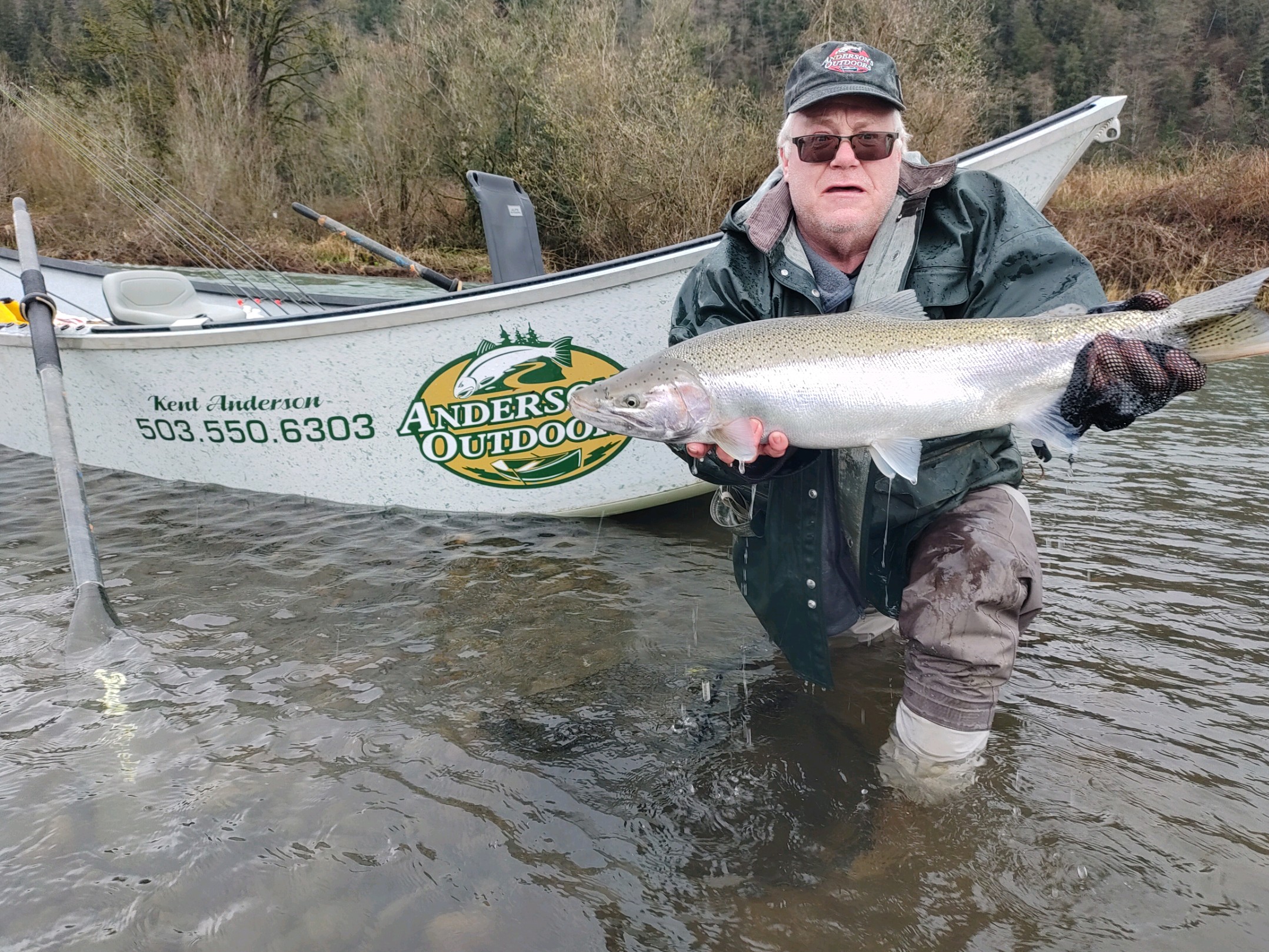 Dave hoists one of the 3 chromers that they caught Sunday morning.jpg