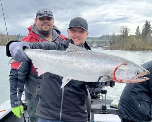 Pro guide Cameron Kennedy (503-535-9600) pictured here behind his client, with a nice Oregon C...jpg